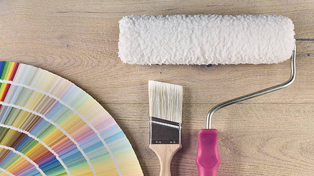 istock Paint bucket with paint brush, roller and palette color 637043464