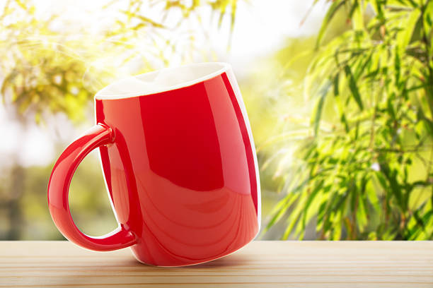 istock Red coffee cup empty front porch the morning 637044416