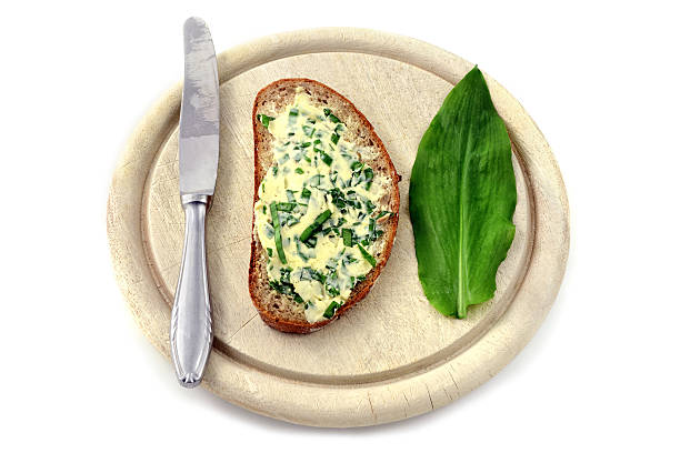 istock wild garlic butter and fresh leaves 637051238