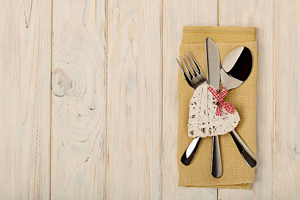 istock Valentine's day concept. On the wooden table cutlery 637052926