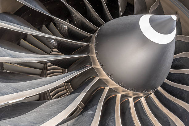 Jet aircraft engine intake Main fan on a large jet (turbine) engine which powers large commercial transport aircraft jet intake stock pictures, royalty-free photos & images