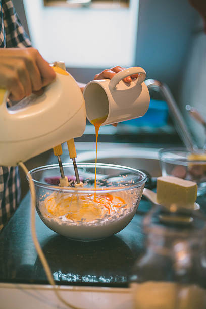 istock happy woman cooking on kitchen 637057634