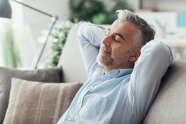 istock Businessman sleeping on the couch 637058760