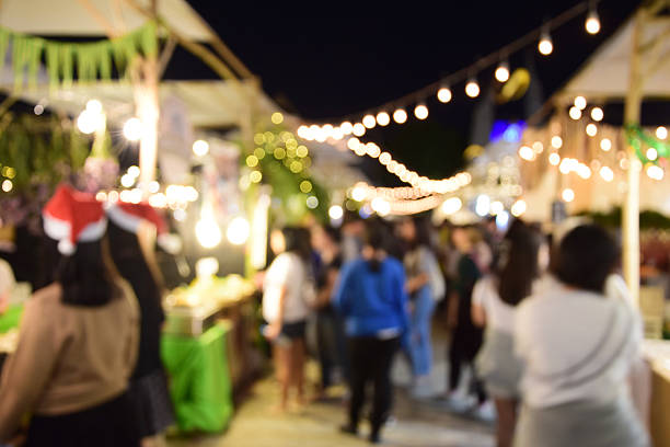 istock blur image food at night festival with bokeh background. 637060344