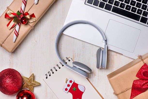 istock Flat lay of christmas gift with laptop 637061258