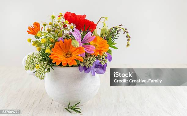 Decorative Flowers In A White Vase Stock Photo - Download Image Now - Bouquet, Variation, Bunch of Flowers