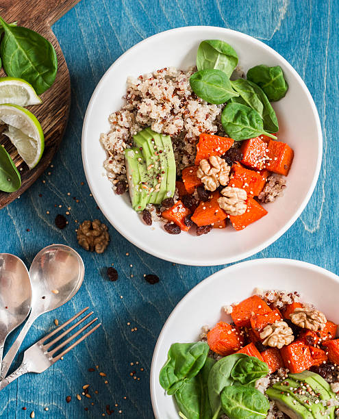 istock Quinoa with pumpkin, spinach and avocado. Healthy quinoa bowl 637065386
