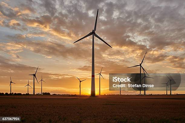 Wind Farm In Sunset Stock Photo - Download Image Now - Electricity, Environment, Horizontal