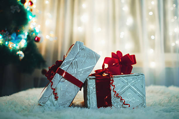 istock Christmas gifts and tree 637068538