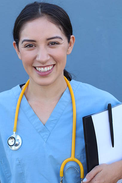 istock Beautiful female doctor looking at the camera 637069642