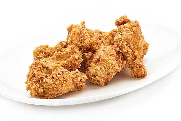 istock hot fried chicken wings in basket isolated on white background 637070022