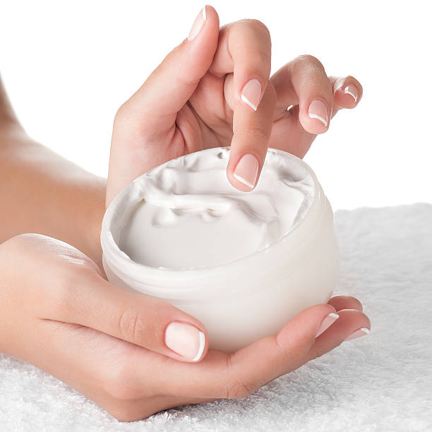 istock Woman applying cream 637070116