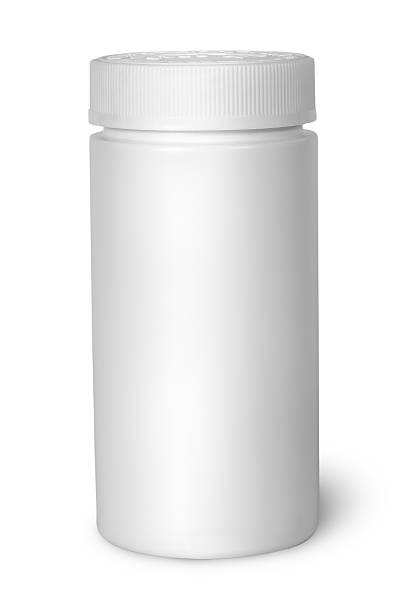 istock White plastic bottle for vitamins with lid closed 637070988