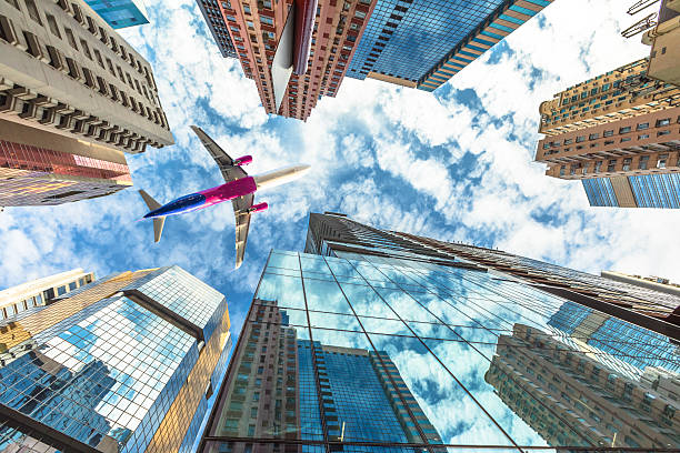 Free Stock Photo of Upward view of skyscrapers and airplane | Download ...