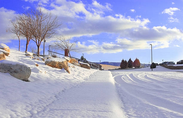 Winter in the city landscape with snow and bright blue sky