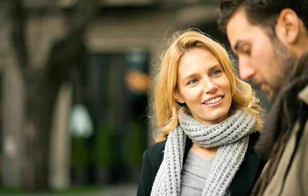 istock Smiling woman looking at her boyfriend 637075692