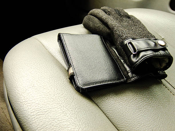 istock Wallet and Gloves on the Front Seat 637075696