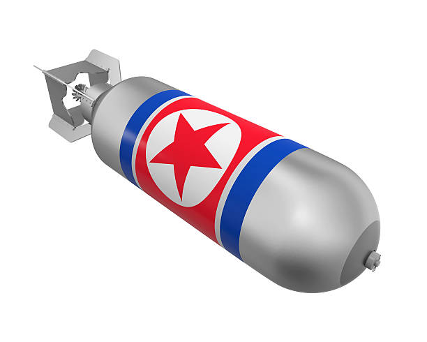 atomic bomb with north korea flag - north korea hydrogen bomb korea missile imagens e fotografias de stock