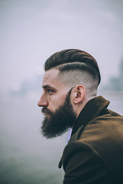 istock Hipster standing on the street 637076380