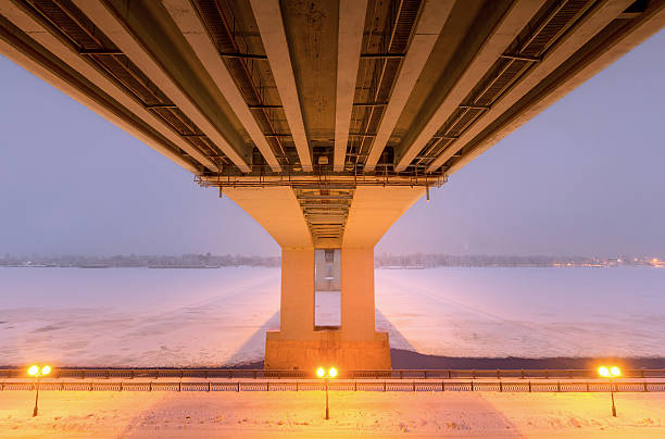 istock large bridge over the frozen river. 637076600