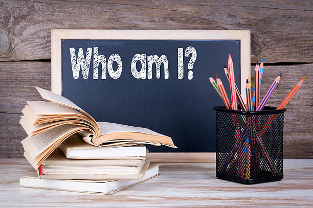 istock Who am I. Stack of books 637076660