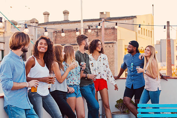 istock Happy friends at the rooftop party 637077834