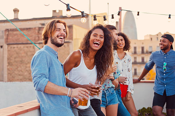 istock Happy friends at the rooftop party 637077892