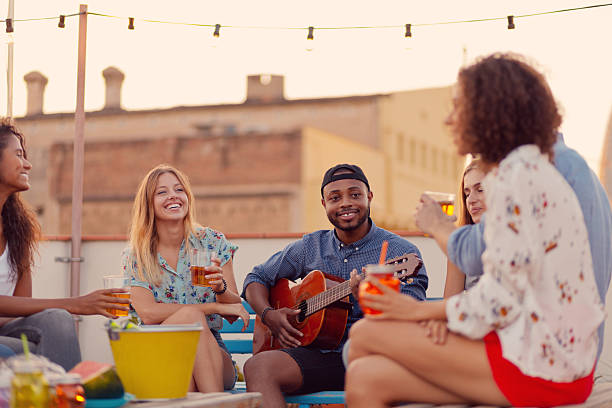 istock Happy friends at the rooftop party 637078150