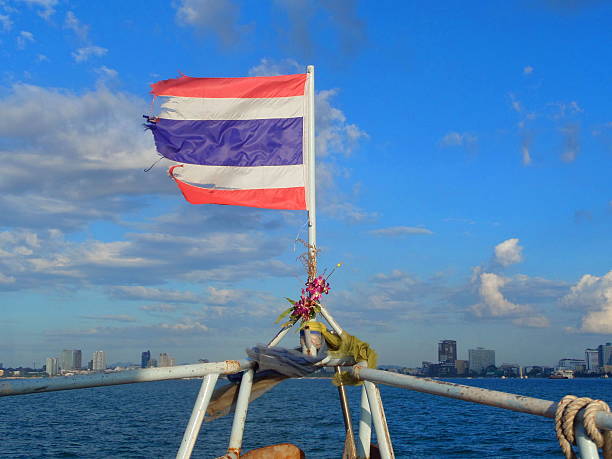 istock Thai flag on a boat in the wind - Thailand 637080732
