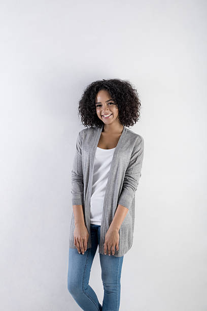 istock Millennial female model with afro hairstyle looking at the camera 637082952