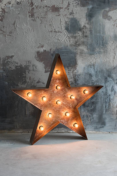 istock Large decorative retro star with lots of burning lights on 637083012