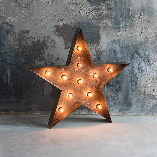 istock Large decorative retro star with lots of burning lights on 637083142