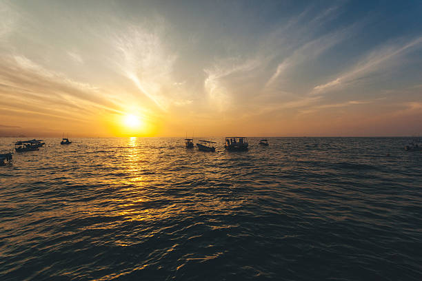 istock sunset on the ocean horizon 637085064