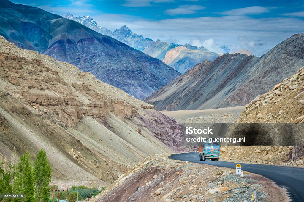 Indian truck on the Srinagar-Leh highway in Ladakh, India Indian truck on the Srinagar-Leh highway in Ladakh, India. This road, also called Indian National Highway, crosses seveal high mountain passes, the most wellknown are Fatu La (4.100 m) and Zoji La (3.528 m altitude). Srinagar Stock Photo