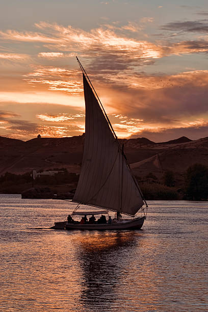 istock Traditional Egyptian Sailboat at Sunset 637087734