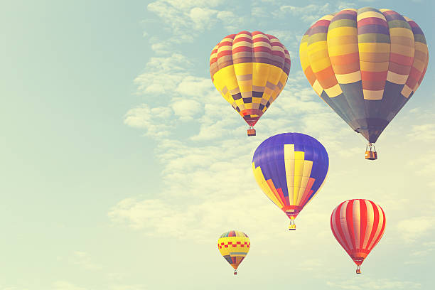 istock Hot air balloon on sun sky with cloud, vintage and 637091176