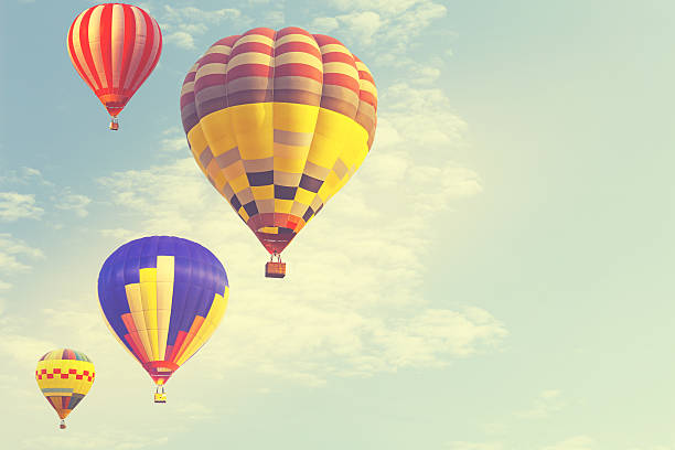 istock Hot air balloon on sun sky with cloud 637091390