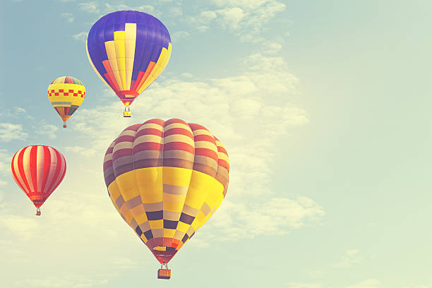 istock Hot air balloon on sun sky with cloud 637091394