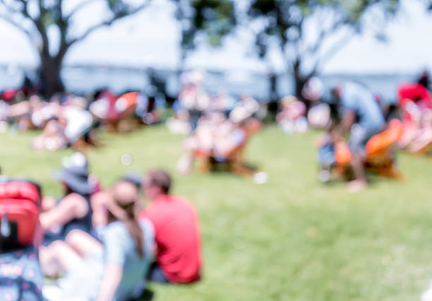 istock Blur defocused background of people in park 637092600