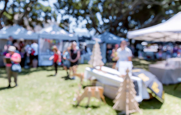 istock Blur defocused background of people in park 637092618