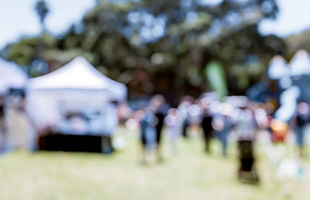 istock Blur defocused background of people in park 637092628