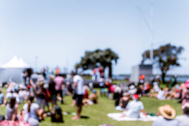 istock Blur defocused background of people in park 637092634