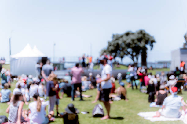 istock Blur defocused background of people in park 637092646