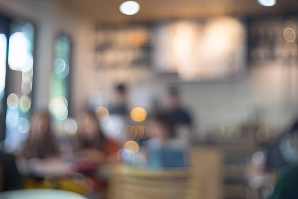 istock Coffee shop blur background with bokeh image 637092654