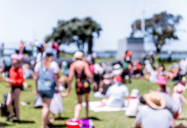 istock Blur defocused background of people in park 637092660