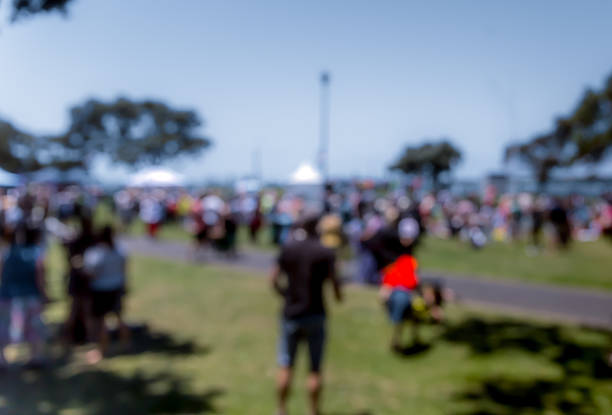 istock Blur defocused background of people in park 637092694