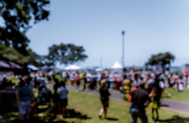 istock Blur defocused background of people in park 637092728