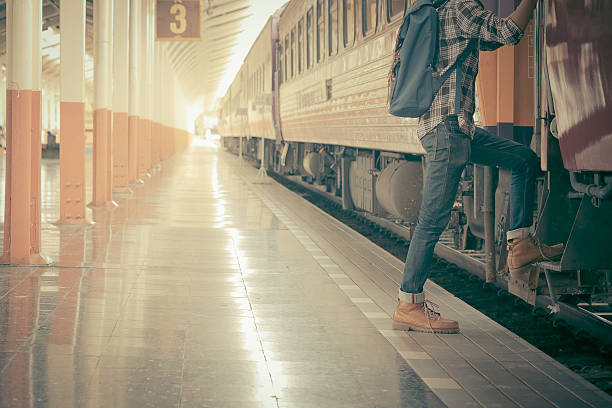 istock Young traveler with backpack in the railway. 637092796