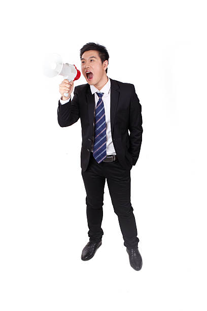 istock Young Businessman Holding Megaphone 637093732