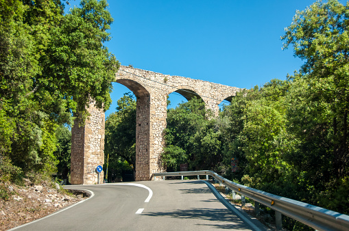 Aqueduct over the road in the mountains of Mallorca, Spain